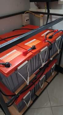 A picture of CCTV satellite and electric fence installations