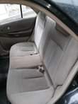 A picture of Toyota Mazda protege for sale Portharcourt Choba prescisely First body