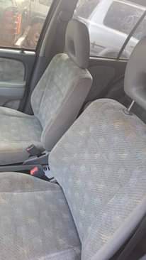 A picture of 2002 Raum Toyota White