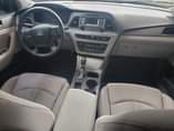 A picture of 2015 model Luxury Hyundai sonata neat creamy fabric Opholstery engine