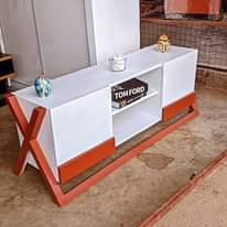 A picture of TV showkes kitchen cabinets