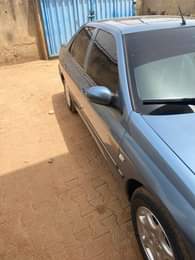 A picture of Peugeot prestige going for 3 2M