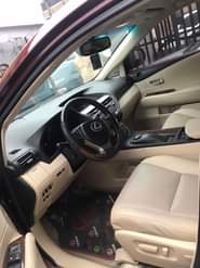 A picture of Reg 2013 Lexus Rx350 Burgundy on Cream interiors Car is