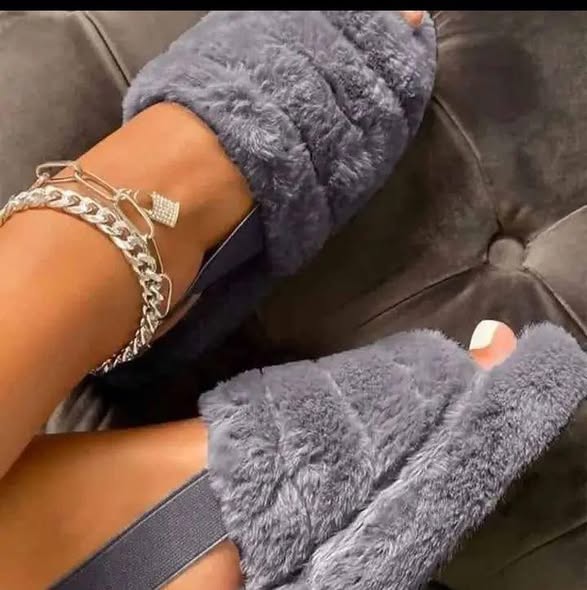 A picture of FLUFFY SLIDES ALL SIZE AVAILABLE CALL US ON 0788292299