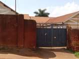 A picture of Nanganda kansanga rd plot starts with tarmac
