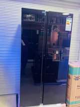 A picture of Pixel 670 litres Black mirror finish With a dispenser Total