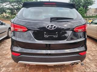 A picture of Sweet Distress 2015 hyundai santa fe with untampered everything and