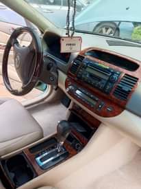 A picture of Toyota Camry first body pan motor engine and gear ac