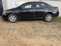 A picture of Corolla 2009 buy and drive nothing to fix Big engine