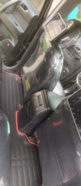 A picture of 2010 highlander upgraded to 2020 thumbstart powerboot reverse camera android