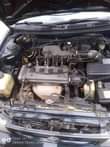 A picture of Sharp Toyota Corolla Engine Gear Ac good Buy and drive