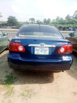 A picture of Make Toyota Model Corolla Year 2004 Color Blue Engine Perfect