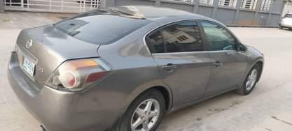 A picture of Neatly used Nissan Altima Bearly driven Thumb start Painted on