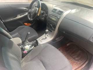 A picture of Toyota Corolla 2009 Color Silver First body Neatly used Oven