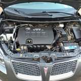 A picture of 2009 Pontiac Vibe and Toyota Corolla