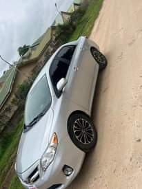 A picture of 8m with sambo 2013 Toyota Corolla on belt with untampered