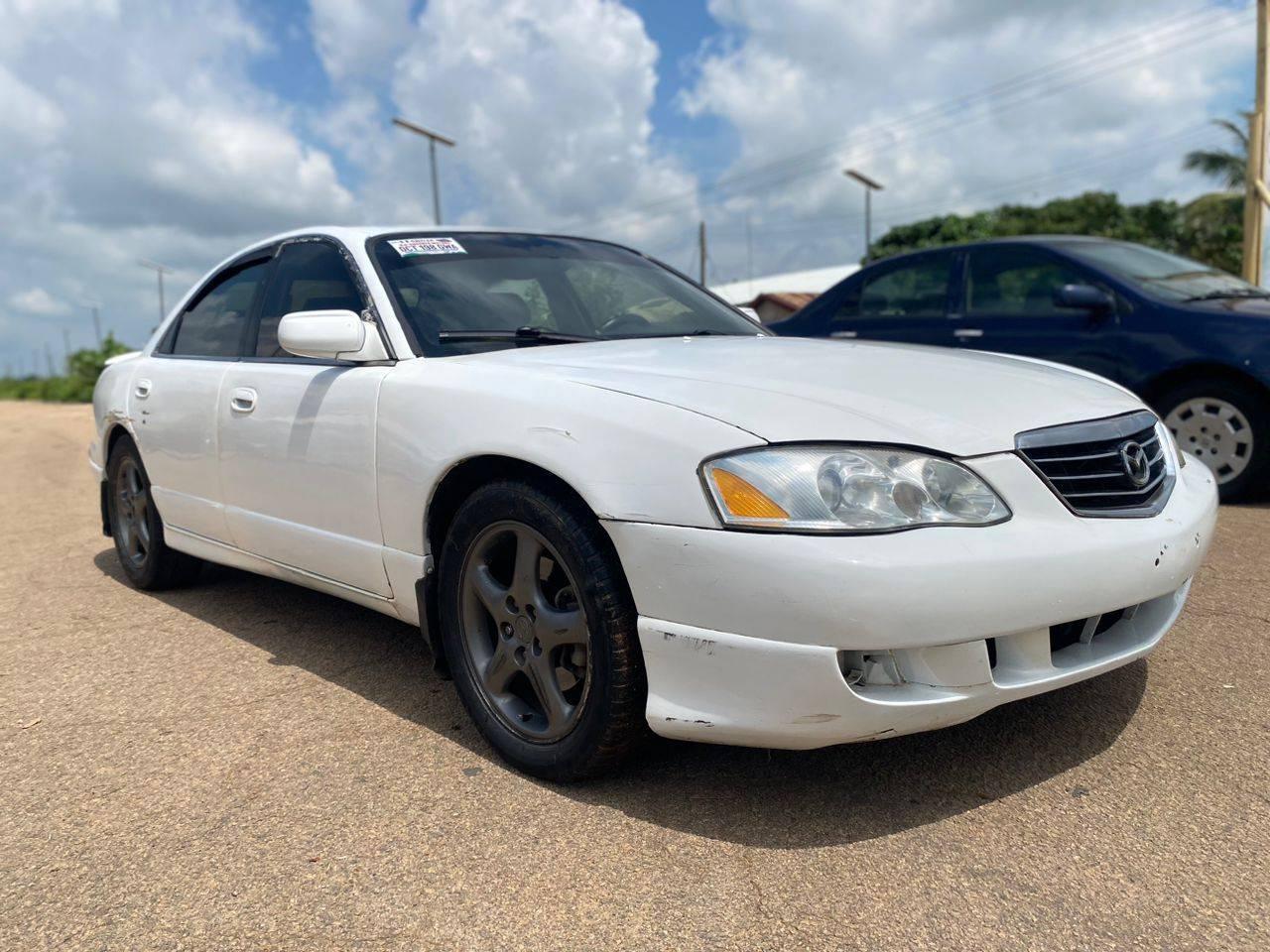 A picture of Distress Distress Distress Extremely clean Mazda millionia used 2004 Price