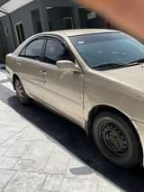 A picture of Toyota camry 2004 engine and gear working very perfect never