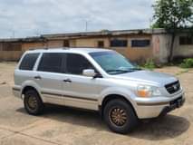 A picture of REGISTERED HONDA PILOT 2004 MODEL UNTAMERED ENGINE AND GEAR CHILLING