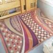 A picture of bed side lamp and center carpet