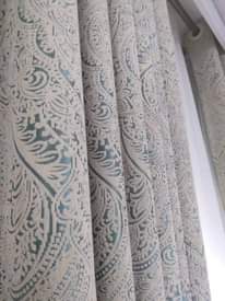 A picture of Curtains and rods