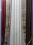 A picture of Curtains and rode