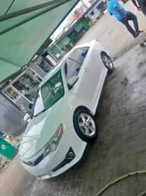 A picture of Registered Toyota Camry 012 model Perfect condition percent guarantee nothing