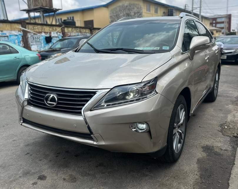 A picture of Tokunbo Lexus RX350 2015 model Clean leather interior Sound V6
