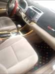 A picture of Toyota Camry 06 Gear engine interior Android screen and reverse