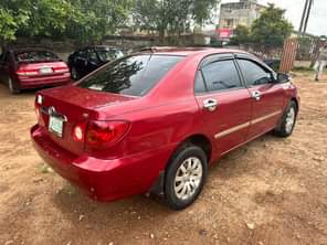 A picture of Toyota Corolla Four plugs Ac chilling Engine and gear transmission