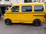 A picture of This Mini Bus was painted for commercial use but owner