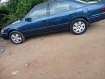 A picture of Toyota Camry tiny light very clean interior sharp body engine