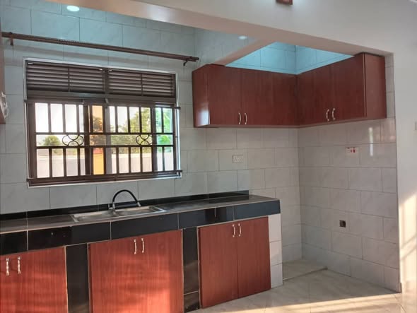 A picture of 2 bedrooms self contained inside kitchen sitting and dining room