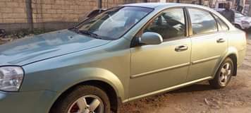 A picture of firstbody 2008 Chevrolet optra with silent engine and gear clean