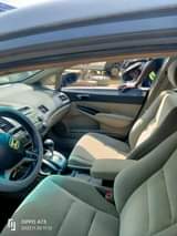 A picture of A very clean Toyota Camry tiny light going Engine and
