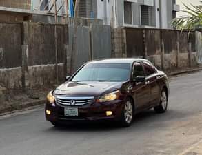 A picture of USED HONDA ACCORD WINE 2009 MODEL WITH SUNROOF AT KADUNA