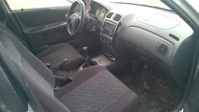 A picture of Very Clean Registered Mazda 323f hatch back Year 2000 forsale