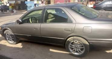 A picture of TINYLIGHT TOYOTA CAMRY Good Condition with AC working Asking Price