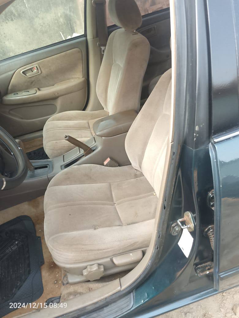 A picture of Toyota Camry. 2.6m negotiable