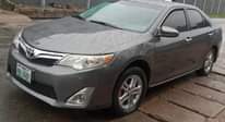 A picture of FIRST BODY TOYOTA CAMRY 2013 IN GOOD WORKING CONDITION BUY