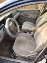 A picture of 04 corolla Smoking engine Auto transmission Ac chilling 1 2M