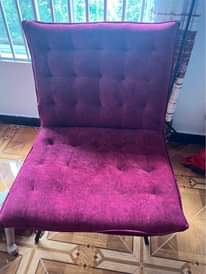 A picture of Dressing mirror 130k single maroon chair 200k and lamp 100k