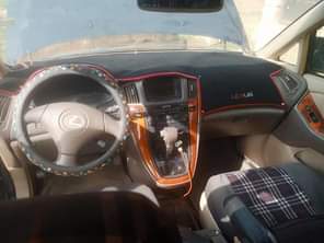 A picture of DISTRESS SALES 2003 LEXUS RX300 First body pan Untampered engine