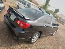 A picture of 2004 upgraded to 2006 corolla sport AC chilling Good tyres
