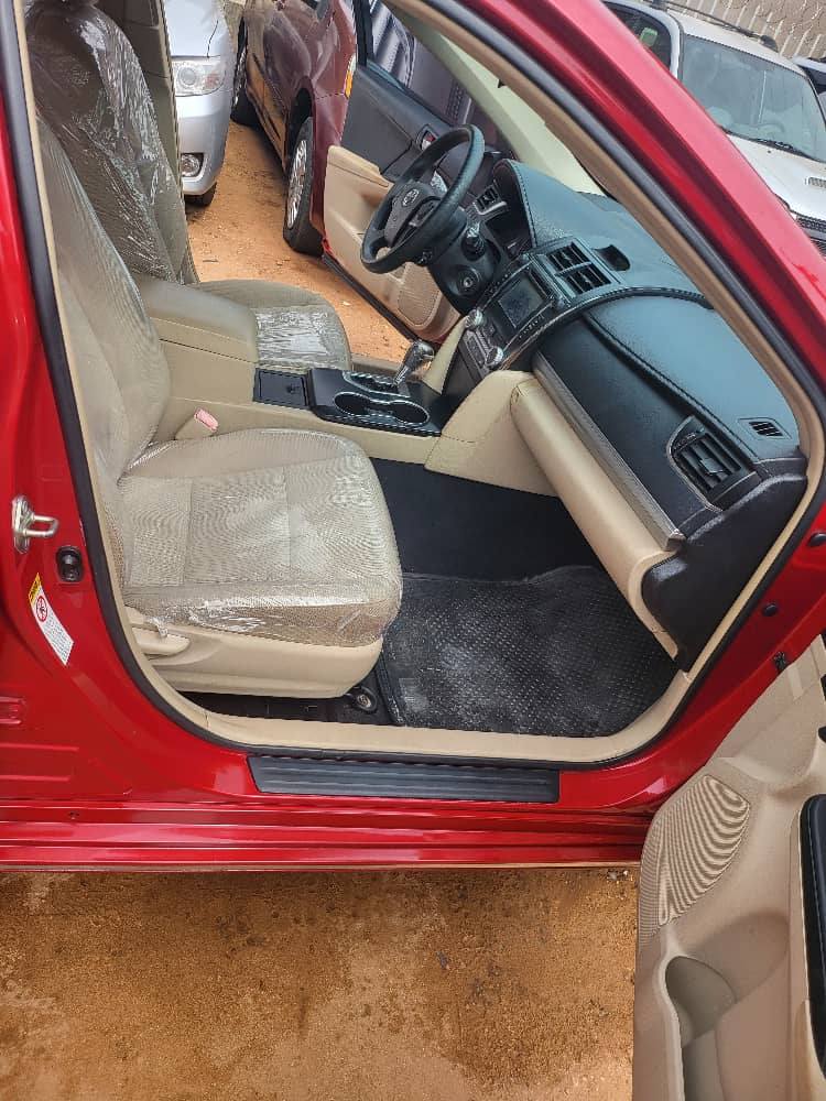A picture of Toyota Camry 2014 model first body tokumbo location Onitsha everything