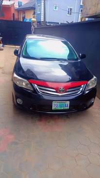 A picture of Toyota Corolla 2011 model. Owner needs money urgently and nothing