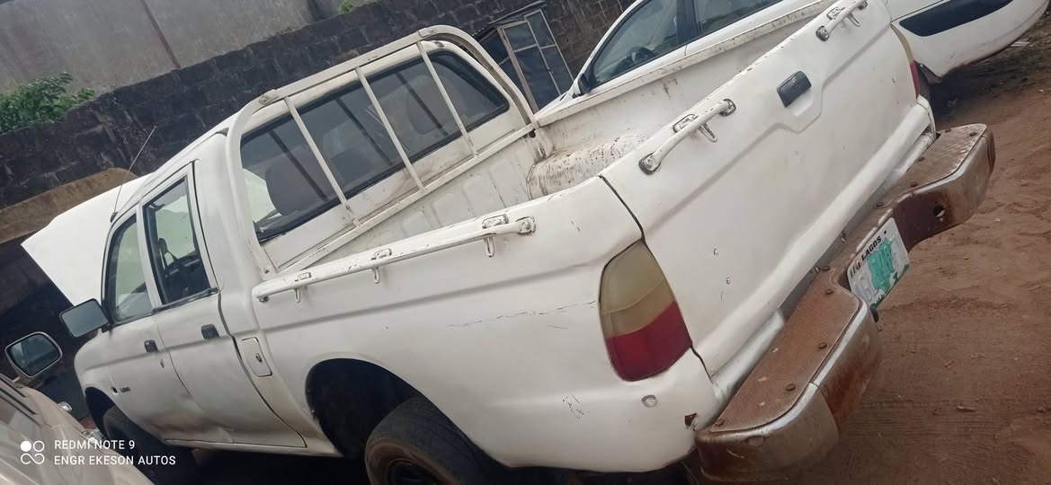 A picture of First Body Mitsubishi L200 Pickup with Auxiliary