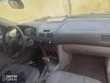A picture of partial first body 2001 Corolla engine gear and AC in