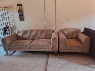 A picture of Four seaters fabric sofa set