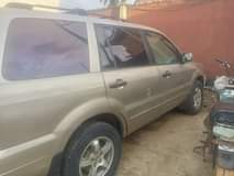 A picture of Registered Honda pilot 2005 painted on first body price 1